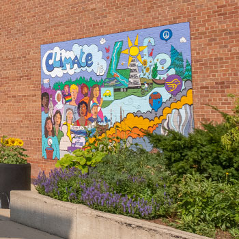 Climate is Life mural on the Theatre Auditorium exterior wall