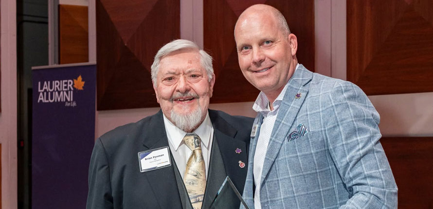 Brian Penam accepts philanthropy award