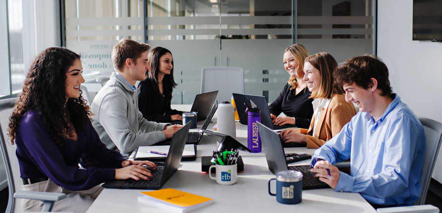alumni in a board room