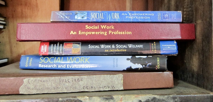Stack of Social Work books