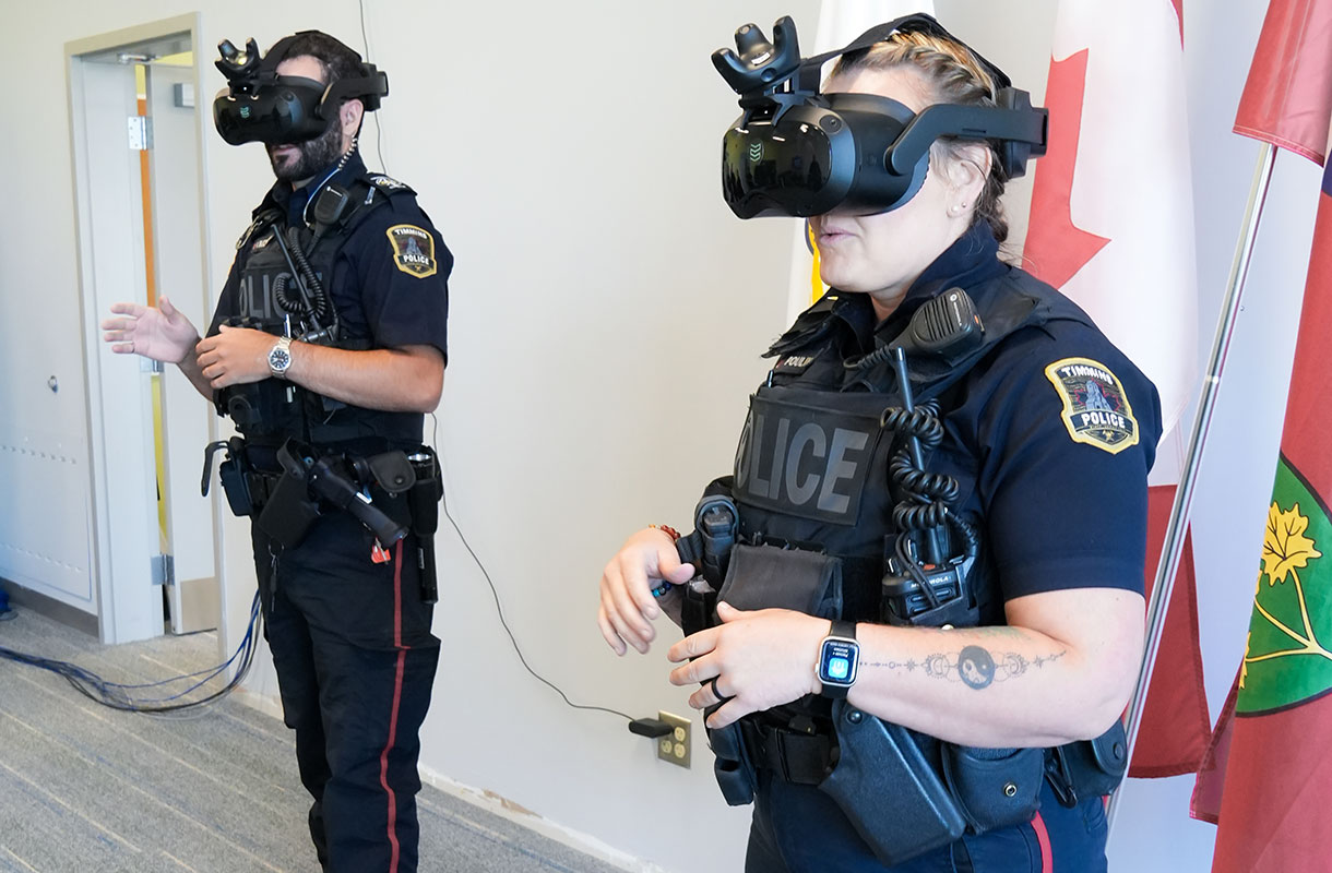 Police officers using virtual reality headsets
