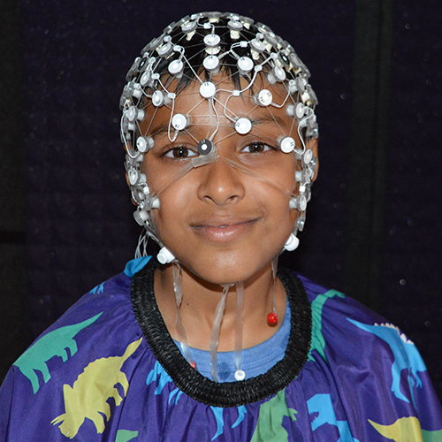 Camper wearing EEG cap