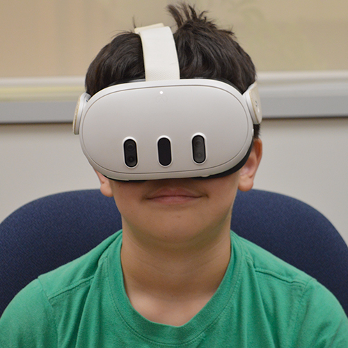 Child wearing virtual reality headset
