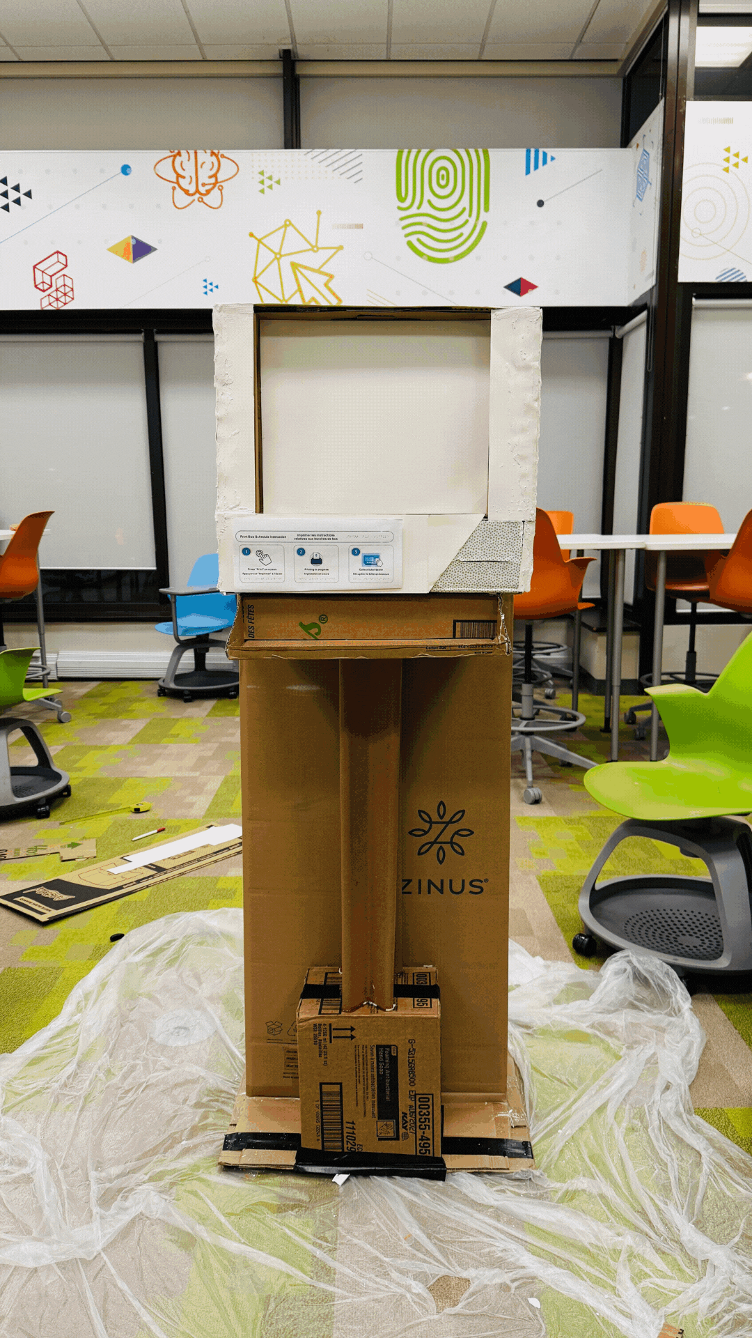 A prototype of the kiosk in various stages of construction