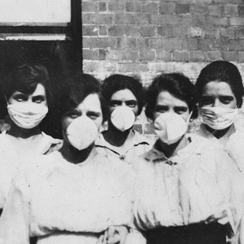 Five women wearing surgical masks during the Spanish Flu outbreak in Brisbane, 1919.