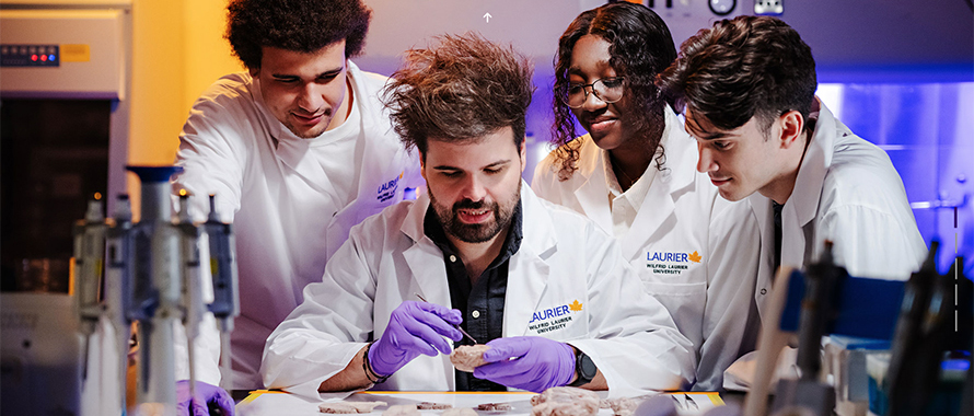 Instructor and students in lab